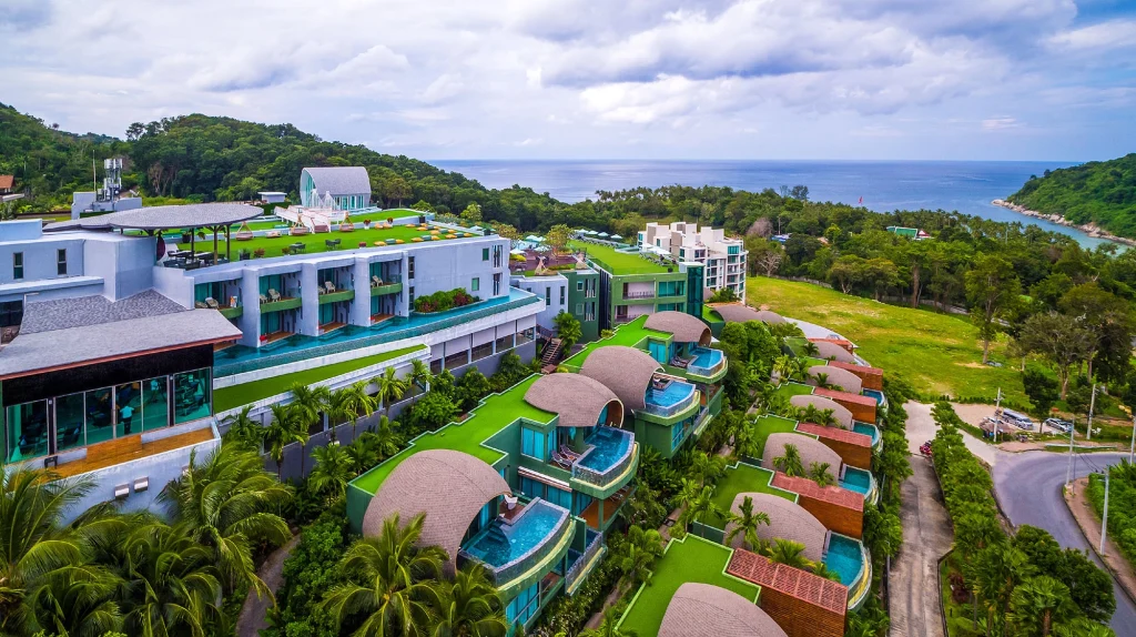 Aerial view of Crest Resort & Pool Villas, one of the Phuket hotels on the hillside near Patong, with pool villas facing the sea